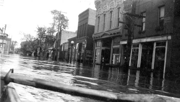 <B>Rowing Down Main Street</B> in Beardstown, Illinois during a flood (undated).