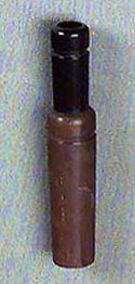 <b>Olt Duck Call</b><br>Philip Sanford Olt (1870-1950)<br>P.S. Olt Company, Pekin Illinois<br>Wood, rubber, 5 inches long<br>Illinois State Museum Collection (1978.10)