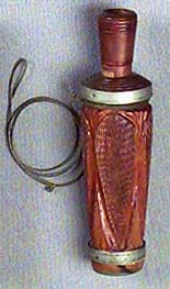 <b>Raised Panel Duck Call</b>, circa 1950-75.<br>Unknown maker, St. Lawrence River<br>Wood, etched silver bands, 6 inches long<br>Illinois State Museum Collection (1978.9.3)<br>Gift of Lloyd Aitchison, Lacon, Illinois