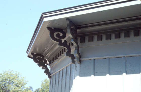 <b>Detail of plank road toll house</b>. Dickson Mounds Museum.<BR>This detail shows the dentil molding along the frieze, and the oriental-style brackets influenced by the popular Neo-classical styles of the day.