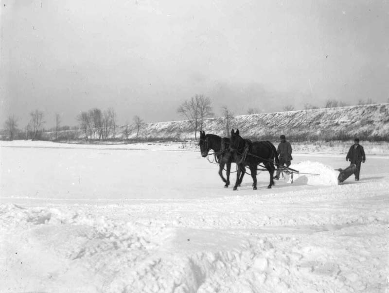 <B>Horse-drawn Ice Plow</B><BR>The horse-drawn ice plow was used to cut grooves into the ice to create a grid. The plow was run several times over the same place, cutting deeper at each pass.