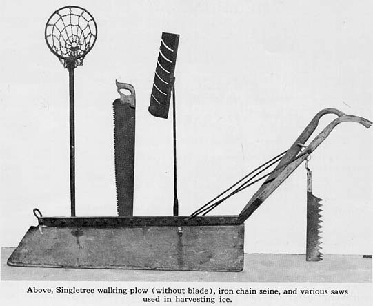 <B>Ice Harvesting Tools</B><BR>These tools are an example of ice-harvesting technology circa 1900. The Singletree walking-plow cut lines in the ice to make a grid. Ice saws finish cutting through the thick ice.