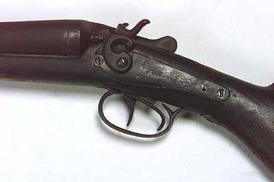 <b>Double barrel shotgun</b> marked T. Barker. No. 188.<br>Seized during Taylorville Mine Wars.<br>Illinois State Museum Collection
