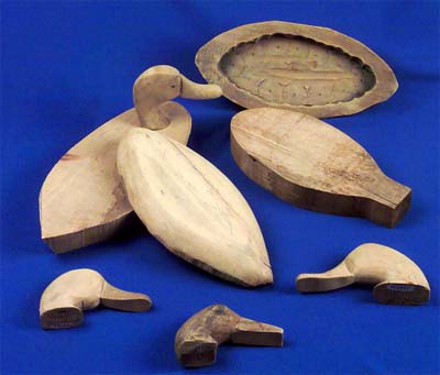 Carved parts of wooden decoys