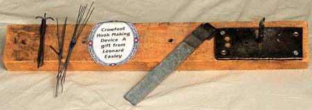 <b>Crowfoot Hook Making Device</b>.  <br>Wood, metal.  <br>Meredosia River Museum Collection, Meredosia, Illinois.  <br>Donated by Leonard Easley.