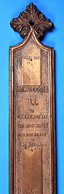 <b>Cast Iron Plaque, circa 1930</b>. According to Luke Hobson of Meredosia, Illinois this marker was placed on a concrete post at the foot of Main Street by the Village Board, where it remained until the flood of 1943 covered it with water and a passing boat knocked it down.