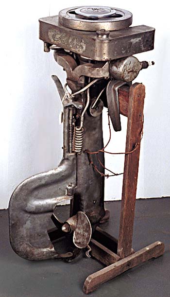<b>Elto Light Twin Outboard Motor</b>,  Elto Outboard Motor Company, Milwaukee, Wisconsin, ca. 1921-1926. <br> Aluminum, motor no. C16131.<br> Designed by Ole Evenrude.<br>  Meredosia River Museum, Meredosia, Illinois. <br>On loan from John W. Petri.