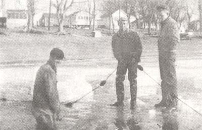 <b>Nets Under Ice</b>, circa 1940s.  Pictured are Charles Hall, Frank Crews, and Junior Fesha.