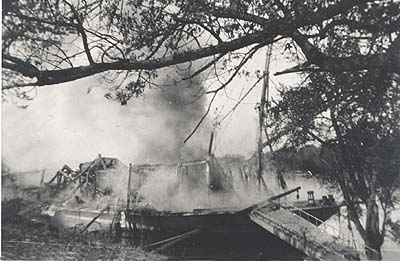 <b>The Majestic on Fire</b>.  The paddlewheeler burned at Matanzas Beach in 1922.