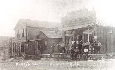 <b>Browning, Illinois</b>, circa early 1900s.  From right to left, Arnold's Resturant, barber shop, and J. H. Kelly store.