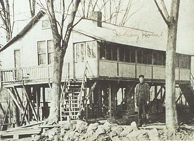 <b>Sanganois Gun Club</b>, circa early 1900s.  Jakey Willard in front of the club house on the river front at Browning.