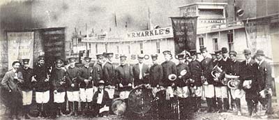 <b> The Big Band from the Grand Floating Palace</b>, stading in front of the W.R. Markle, an excursion boat from Pittsburgh. An example of the hey-day of showboats, when bands and variety acts brought entertainment to people who lived in small towns and large cities along America's rivers.