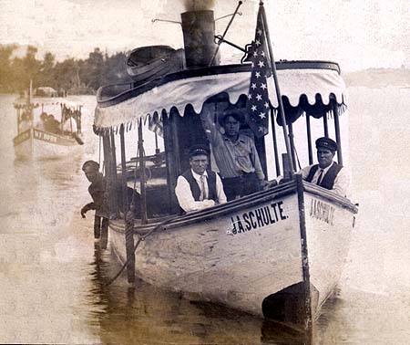 <b>The J. A. Schulte</b> with Captain Lester Robinson at the wheel.