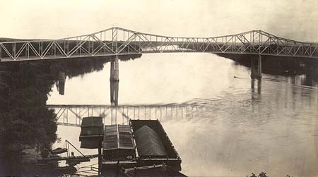 <b>Barges Tied Up at the Bridge</b>.  The Scott W. Lucas Bridge at Havana, Illinois.