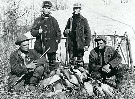 <b>A Good Morning Kill</b>, circa 1903-1920.  Ross Shinn, R. Thackwray, R. Hopkins and P. Hatch with their limit of ducks.