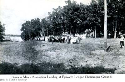 <b>Lined Up</b> at the Business Men's Association landing at the Epworth League Chautauqua grounds in Havana, Illinois.  Postcard.