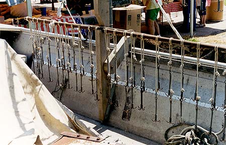 <b>Crowfoot Bars</b><br>Close-up of crowfoot bars and canvas mule (left) on Leonard Easley's fishing boat.  Meredosia Riverfest, June 5, 1999, Meredosia, Illinois.
