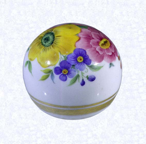 <B>Handpainted Paperweight<BR>Bohemia (attributed)<BR>factory unknown, circa 1850-1900</B><BR>Diameter: 6.5 cm (2 1/2 inches)<BR>(702341)<BR>(view one)<BR><BR>Clear glass weight overlaid with opaque white glass; hand-painted flowers in pink, yellow, and rust with green leaves; two gilded bands encircling base; deep star-cut extending to perimeter of base