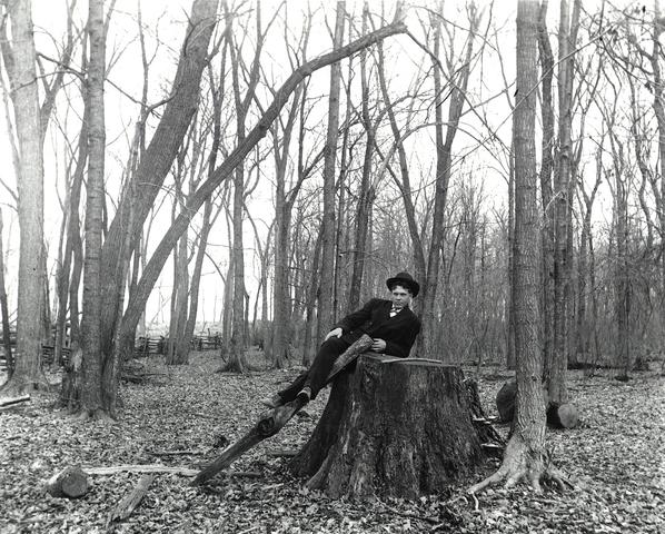 Warren Leaning on a Stump