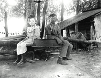 photograph of Mary and Warren on swing