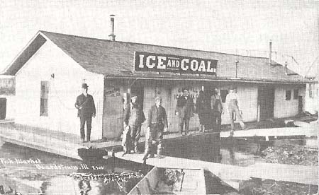 <b>Beardstown Fish Market</b>, circa 1906.  Note the size of the fish the two men are holding.