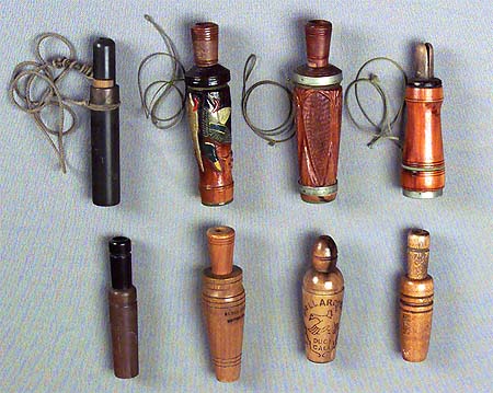 <b>Duck Calls</b><br>Illinois State Museum Collection<br>Top row:J. Fred Mott Jr. Duck call (798881); Carved Perdew (1978.9.4); Raised (1978.3); C. H. Perdew Crow Call (1978.9.3).<br>Bottom row: P.S. Olt (1978.10); Black Duck (1978.9.8); Mallardtone (1978.9.7); Cajun (1978.9.6)<p>See individual call for more information.