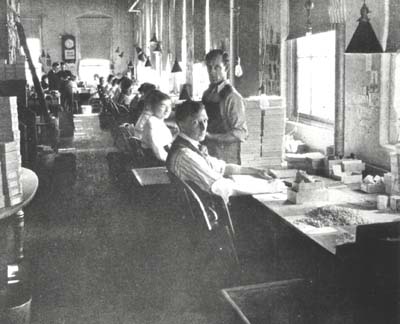 <b>Sorting Buttons</b>, 1919.<br>  After the buttons were cut and polished, they were sorted by quality and put in 10 gross boxes (168 buttons were a long gross).