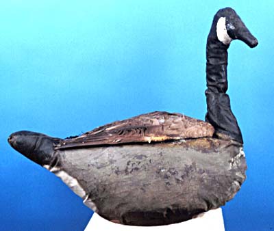 <b>Canvas Goose Decoy</b> with real goose wings.  <br>Canvas over frame, iron rod, goose wings, paint.  <br>Meredosia River Museum, Meredosia, Illinois. <br> Courtesy of Steve Surratt, Meredosia, Illinois.
