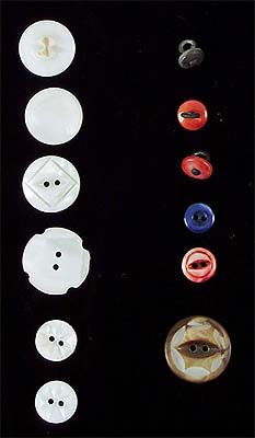 <b>Japanese Pearl Buttons</b><br>The American button industry was protected by tariffs from Japanese competition for many years. The buttons on the left show carving and the buttons on the right are dyed.