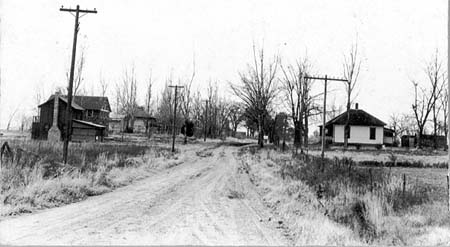 <b>The Road to the Cottages</b>.  Inscribed &quotarea filled with silt",  1939.  Donated by Howard Edlen.