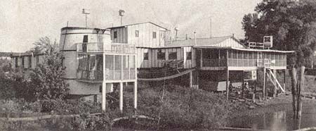 <b>The Naples Boatel</b>, a popular stop along the Illinois River at Naples, Illinois, was made from a grain elevator.