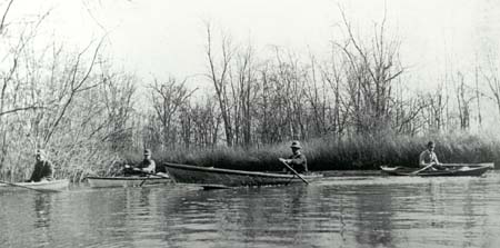 <b>Four Men in Boats</b>