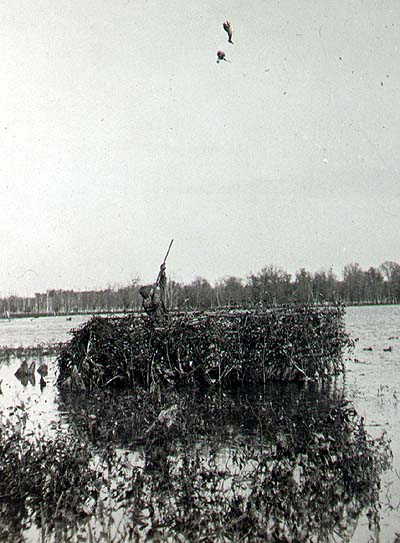 <b>Duck Hunting from a brush-camouflaged blind in Bath</b>.<br>