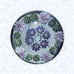 Miniature Pattern MillefioriFranceClichy, circa 1845-55Diameter: 4.5 cm (1 3/4 inches)(7023770)Miniature pattern millefiori weight with concentric rings of millefiori canes in pale pink, green, and purple, around a central white Clichy rose