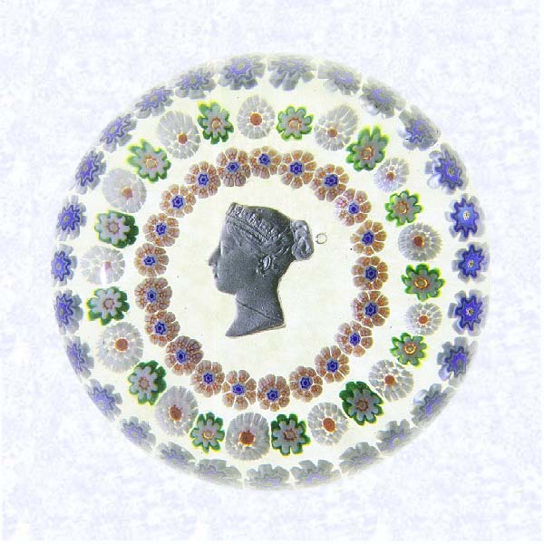 <B>Sulphide of Queen Victoria<BR>France<BR>Baccarat, circa 1845-55</B><BR>Diameter: 7 cm (2 3/4 inches)<BR>(702328)<BR><BR>Sulphide portrait of young Queen Victoria; encircled by three spaced concentric rings of millefiori canes