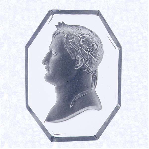 <B>Octagonal Napoleon I Sulphide Plaque<BR><France<BR>Baccarat, circa 1830s</B><BR>Diameter: 5.3cm (2 1/8 inches) Length: 7.6 cm (3 inches)<BR>(702465)<BR><BR>Octagonal clear glass plaque enclosing a sulphide portrait of Napoleon I; beveled edges on both sides of plaque