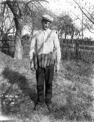 photograph of Frank with corn belt