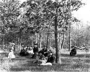 photograph of family in grove